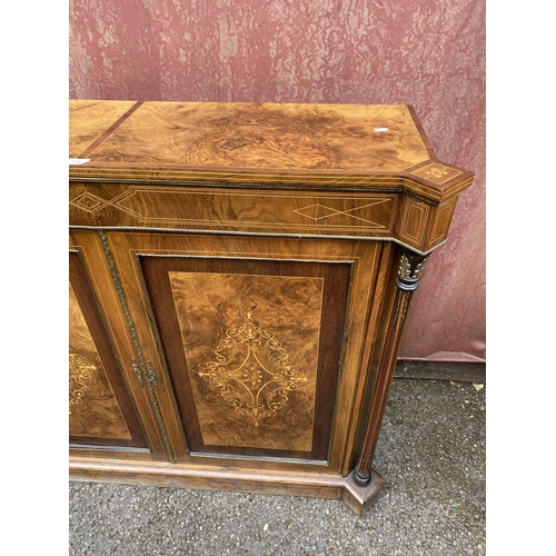 179 - A late Victorian figured walnut, mahogany cross-banded and marquetry cabinet, with turreted corners,... 