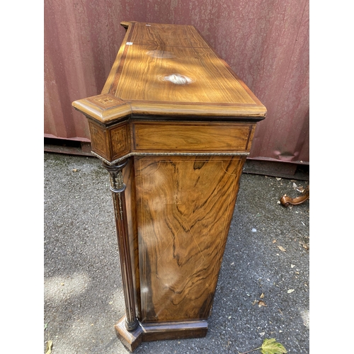 180 - A late Victorian mixed veneer and marquetry cabinet with gilt metal mounts, a pair of panelled doors... 