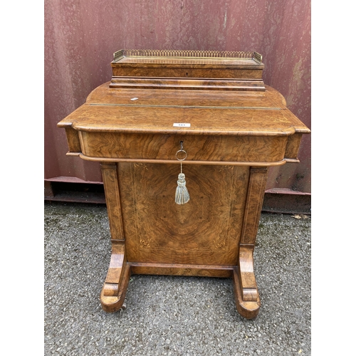 181 - A late Victorian figured walnut and marquetry Davenport, the box top with a hinged lid and gilt meta... 