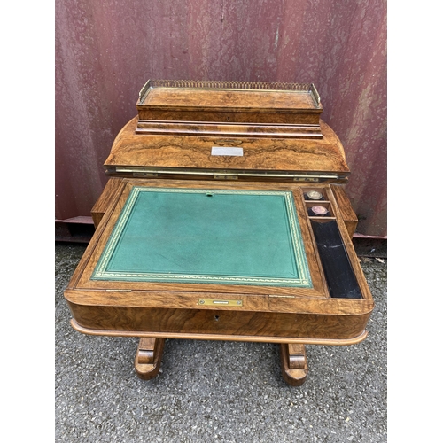 181 - A late Victorian figured walnut and marquetry Davenport, the box top with a hinged lid and gilt meta... 