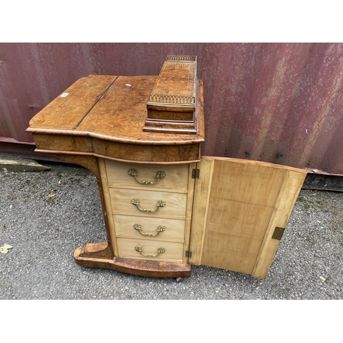 181 - A late Victorian figured walnut and marquetry Davenport, the box top with a hinged lid and gilt meta... 