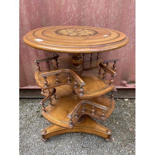 182 - A late Victorian walnut book table with brass and marquetry ornament, over two tiers with spindle ga... 