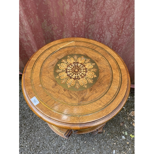 182 - A late Victorian walnut book table with brass and marquetry ornament, over two tiers with spindle ga... 