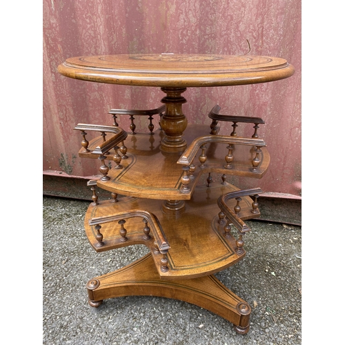 182 - A late Victorian walnut book table with brass and marquetry ornament, over two tiers with spindle ga... 