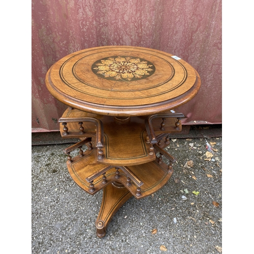 182 - A late Victorian walnut book table with brass and marquetry ornament, over two tiers with spindle ga... 