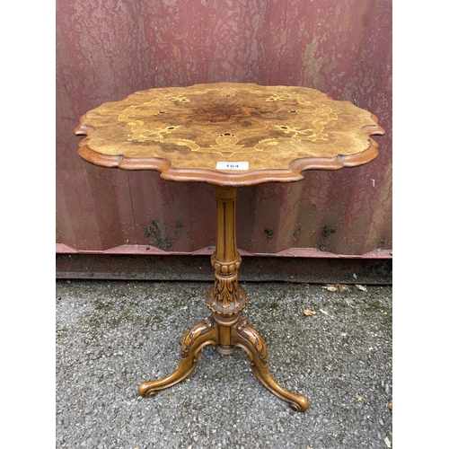 184 - A Victorian walnut occasional table having a burr walnut and marquetry inlay piecrust top, fluted co... 