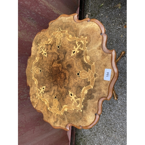 184 - A Victorian walnut occasional table having a burr walnut and marquetry inlay piecrust top, fluted co... 