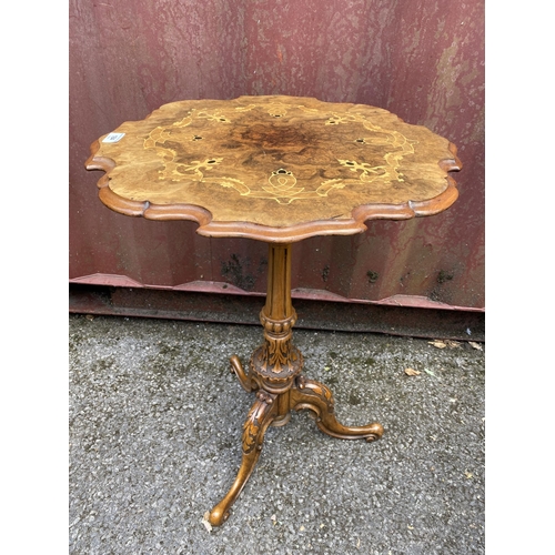 184 - A Victorian walnut occasional table having a burr walnut and marquetry inlay piecrust top, fluted co... 