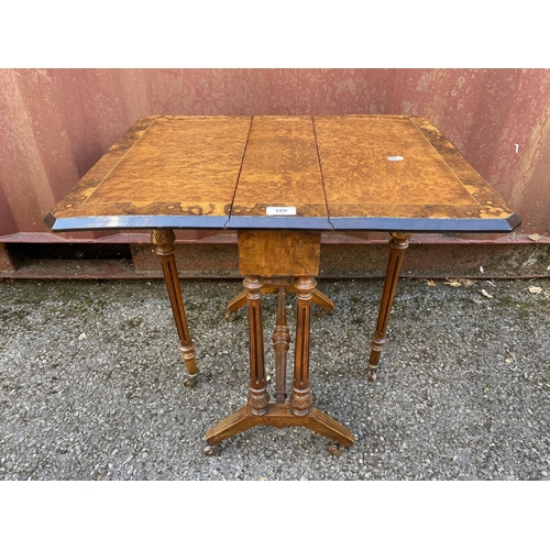 188 - A mid Victorian burr walnut and string inlaid Sutherland table of small proportions, the fall flaps ... 