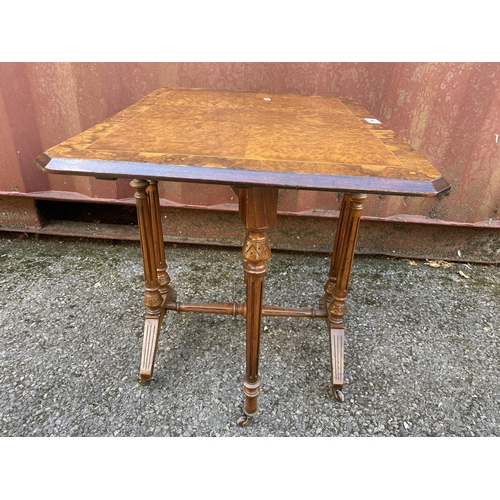 188 - A mid Victorian burr walnut and string inlaid Sutherland table of small proportions, the fall flaps ... 