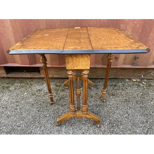 188 - A mid Victorian burr walnut and string inlaid Sutherland table of small proportions, the fall flaps ... 