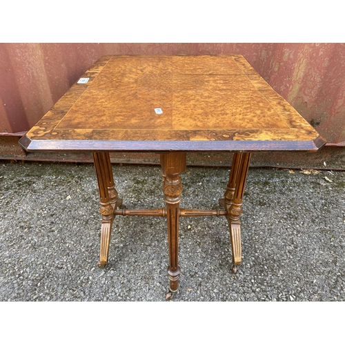 188 - A mid Victorian burr walnut and string inlaid Sutherland table of small proportions, the fall flaps ... 