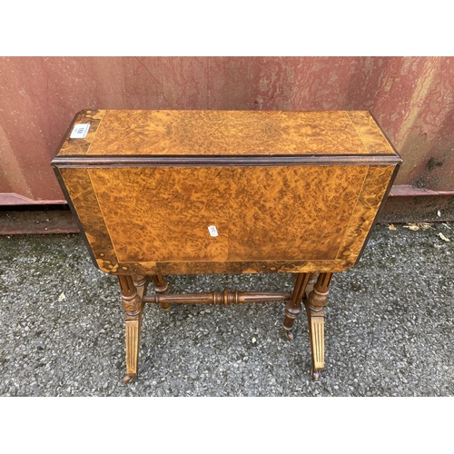 188 - A mid Victorian burr walnut and string inlaid Sutherland table of small proportions, the fall flaps ... 