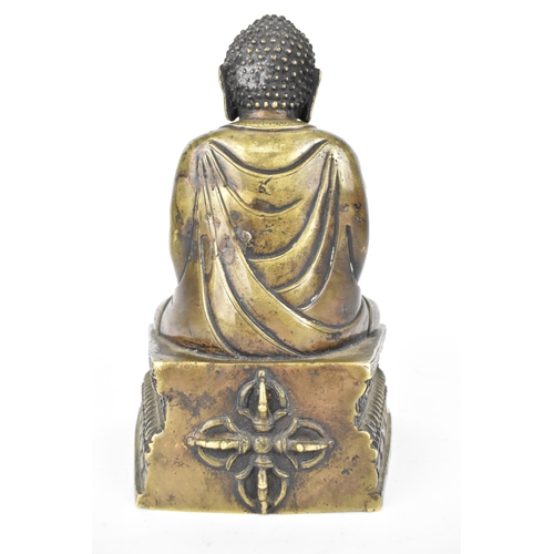 111A - A Sino-Tibetan lacquered bronze or brass statue of Buddha in Dhyana Mudra on a casted base with Vijr... 