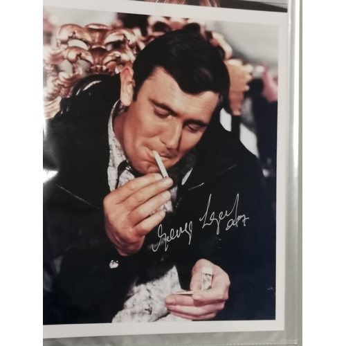 93 - Seven photographs of actors, some signed, to include Roger Moore, Pierce Brosnan, George Lazenby and... 