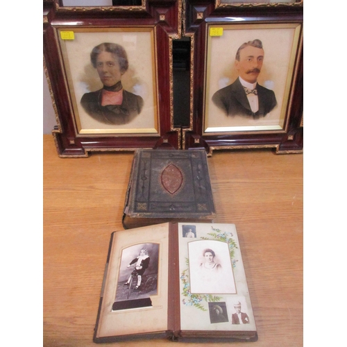 102 - A Victorian leather bound family photograph album with various portrait photographs, a Victorian fam... 