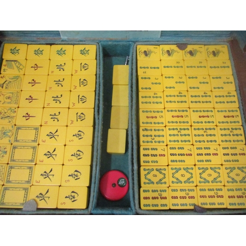 108 - A Hip Yan 'Tsun Kee' Ma Jong Manufactory, Hong Kong leather cased Mah Jong set with resin/plastic ti... 