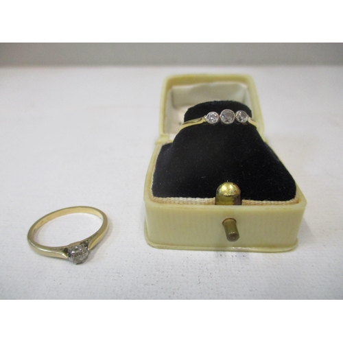 119 - An 18ct yellow gold three-stone diamond ring 2.45g total weight, in a Keystone Elgin ring box, and a... 