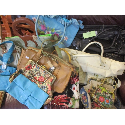 121 - A quantity of modern bags, mostly new with tags, to include Butler & Wilson, Tommy & Kate together w... 