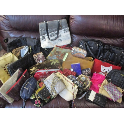 123 - Modern bags and purses, mostly new with tags, to include James Lakeland and Tommy & Kate together wi... 
