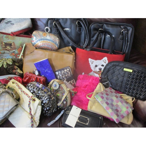 123 - Modern bags and purses, mostly new with tags, to include James Lakeland and Tommy & Kate together wi... 