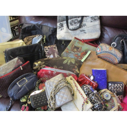 123 - Modern bags and purses, mostly new with tags, to include James Lakeland and Tommy & Kate together wi... 