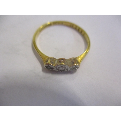 137 - A 9ct gold and three diamond ring, 1.8g total weight
Location: CAB