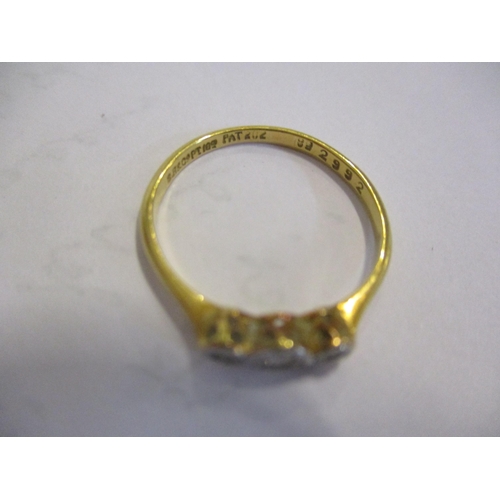 137 - A 9ct gold and three diamond ring, 1.8g total weight
Location: CAB
