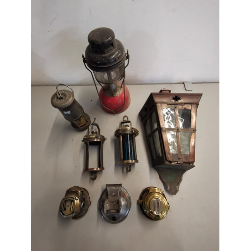 146 - Vintage lighting to include a brass ships lamp marked S and A A P16042, Wolf safety lamp, Powell and... 