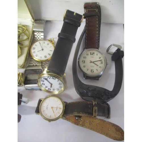 153 - Mixed wristwatches to include a Pulsar, Rodana, Timex, a trench watch and others
Location: CAB