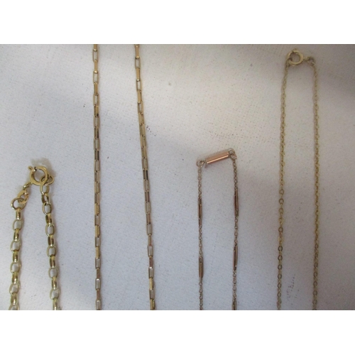 156 - A group of four 9ct gold chain necklaces, and a 9ct yellow gold rope twist bracelet, one necklace un... 