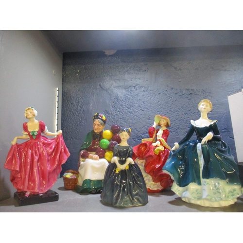 174 - A group of five Royal Doulton figurines to include Delight HN1772, The Old Balloon Seller HN1315, To... 