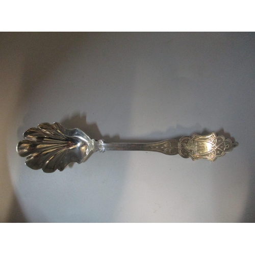 183 - A Victorian Exeter silver long handled caddy spoon or preserve spoon, with shell shaped bowl and eng... 