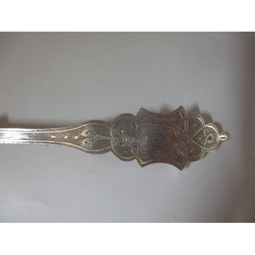 183 - A Victorian Exeter silver long handled caddy spoon or preserve spoon, with shell shaped bowl and eng... 