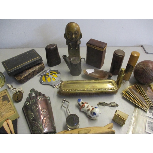 188 - Miscellaneous items of interest to include early 20th Century cigarette cards, a Humpty Dumpty brass... 