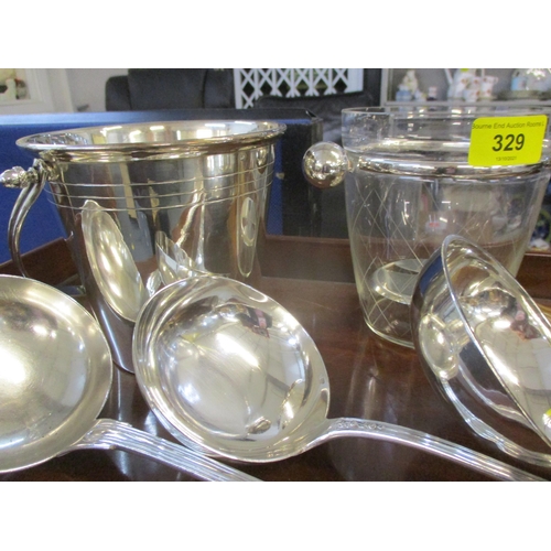 329 - Two small ice buckets, a white metal vanity set, mixed silver plate to include ladles, a white latti... 