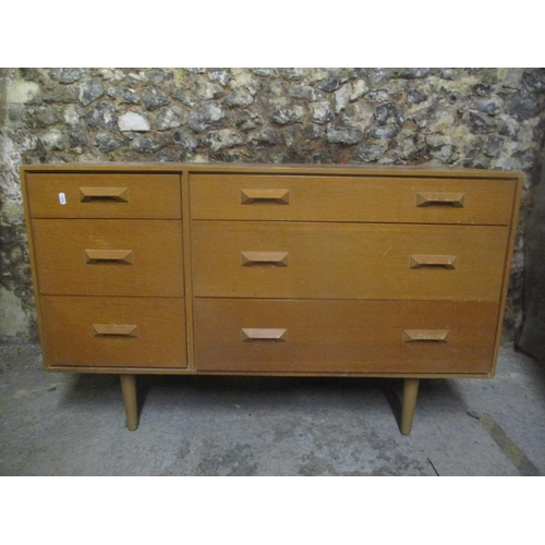 37 - A mid 20th century retro stag Concorde light oak chest of drawers by John & Sylvia Reed having three... 