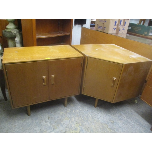 39 - A mid 20th century retro Stag Concorde light oak two door low cabinet by John & Sylvia Reed, 70cm h ... 