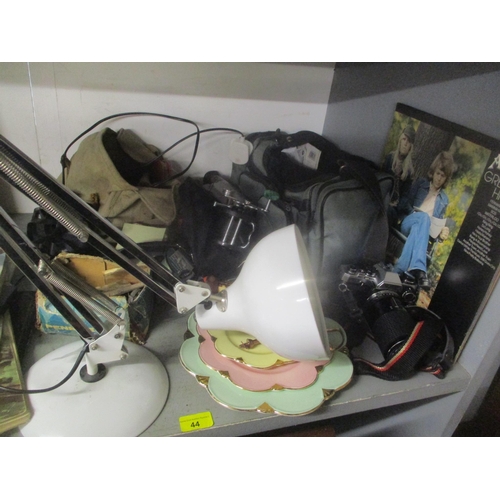 44 - A mixed lot to include fishing reels, mixed cameras, binoculars, anglepoise lamp, Abba LP record and... 