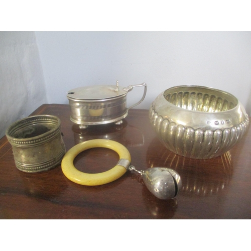 61 - Mixed silver to include a gadrooned sugar bowl, silver and ivory baby rattle, napkin ring and a must... 