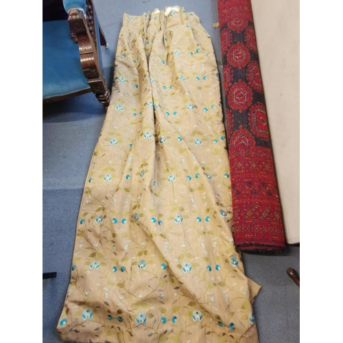 76 - A pair of good quality triple pleat and lined curtains, with a turquoise floral design and a gold sh... 