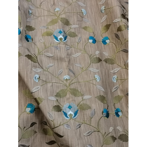 76 - A pair of good quality triple pleat and lined curtains, with a turquoise floral design and a gold sh... 