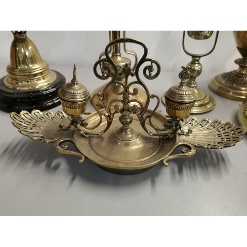 86 - Brassware to include two carriage table lamps, two oil lamp bases, an Art Nouveau ink stand, lidded ... 