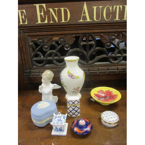 87 - A Herend vase, a Moorcroft yellow Hibiscus bowl, a Lladro figure, a Wedgwood blue Jasperware trinket... 
