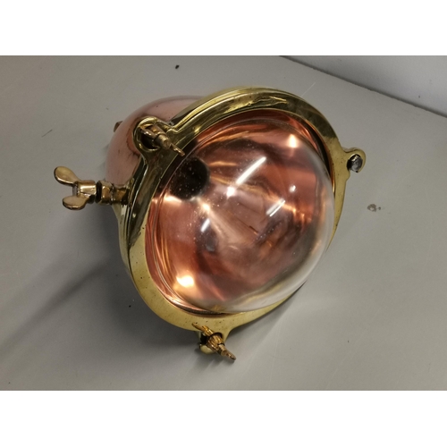 90 - A copper and brass ships light with convex glass shade
Location: 9:6