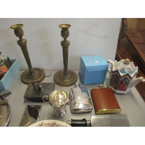 99 - A miscellaneous lot to include a silver trophy cup, 75.6g, hip flasks to include one in the form of ... 