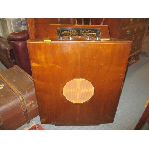 320 - A Murphy A272 walnut cased vintage radio manufactured circa 1957, a small rug, and a canvas and wood... 