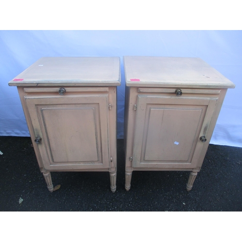 147 - A pair of modern French style painted bedside cabinets having brush slide above single cupboard door... 