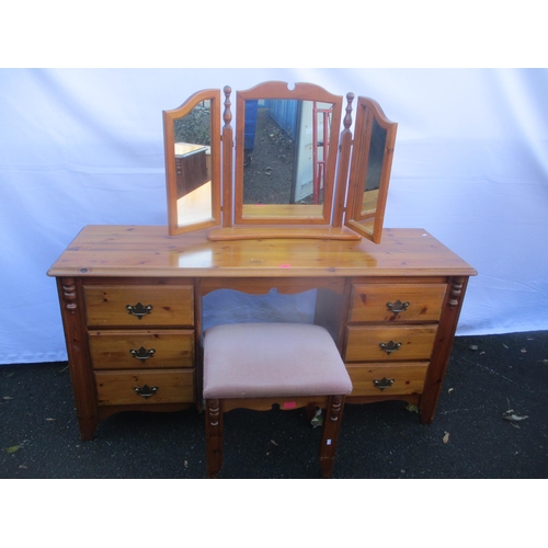 148 - A modern pine dressing table with trifold mirror 132cm h x 149cm w, and a matching stool
Location: C... 