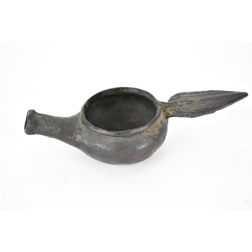 68 - An antique patinated bronze oil burner lamp
Condition: small crack to handle
Location: 10.3